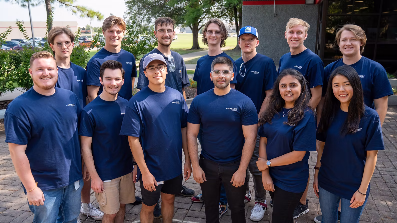Group photo of interns from manufacturing, engineering, and UI/UX departments